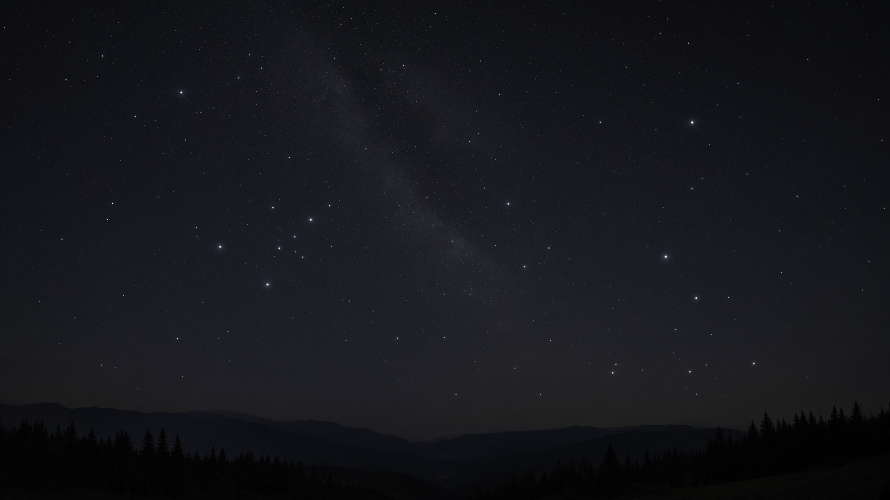 A night just populated. A few lights stand clearly enough to be named.