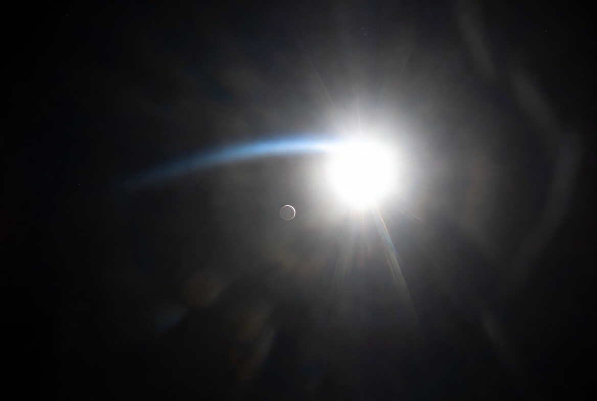 NASA-style photoreal · Mercury near solar glare, first evening visibility after superior conjunction