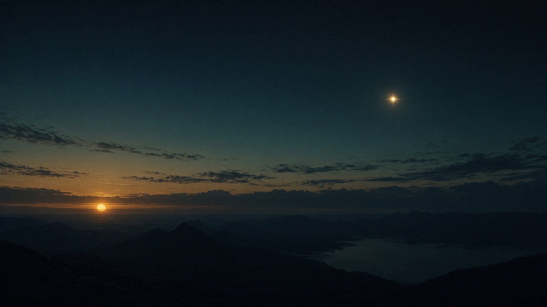 Setting sun far from a high Venus lamp