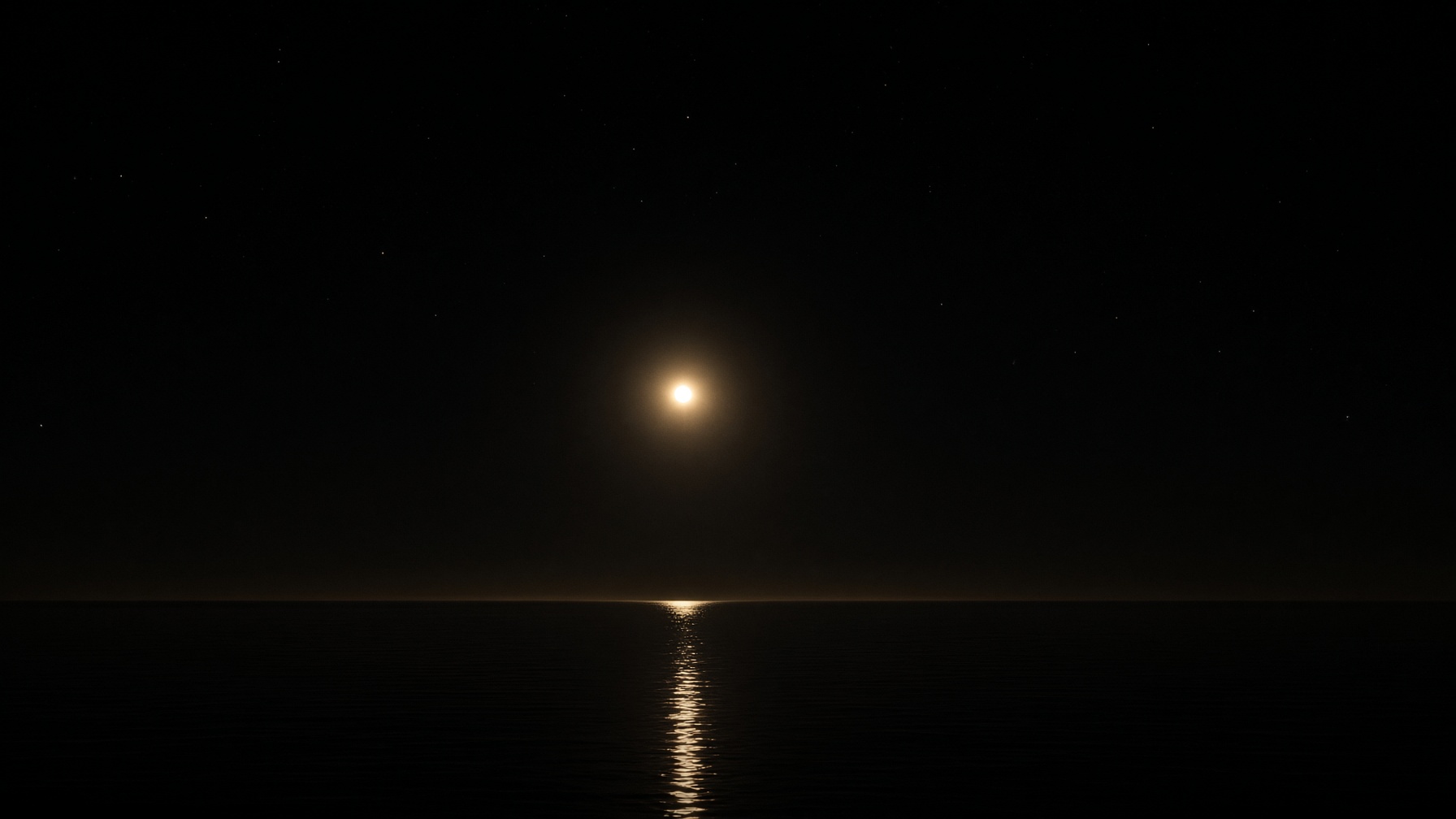 One cream-gold evening lamp over a dark sea