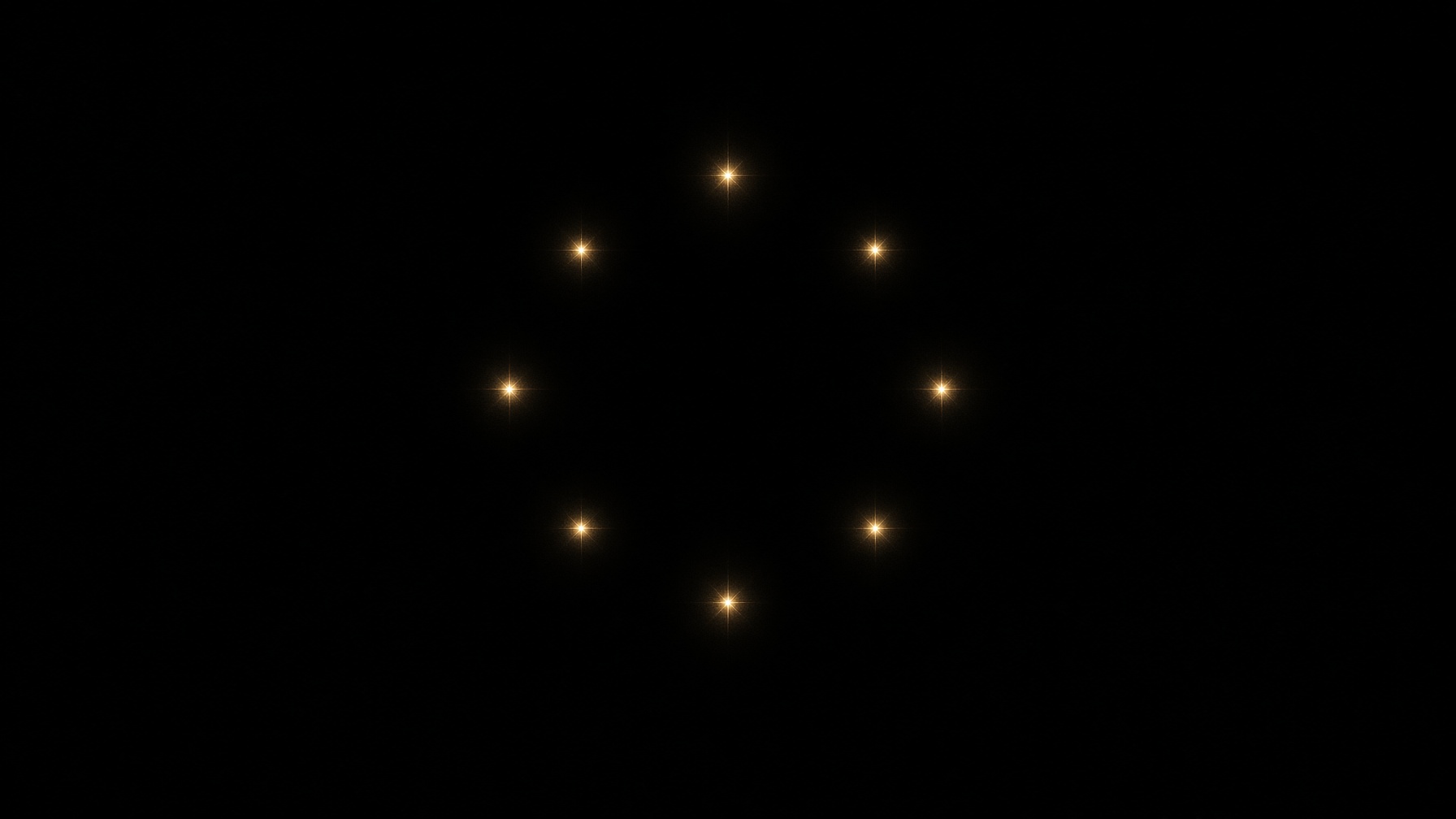 Eight points of champagne light on night.